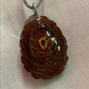 Sliced pine cone pendant